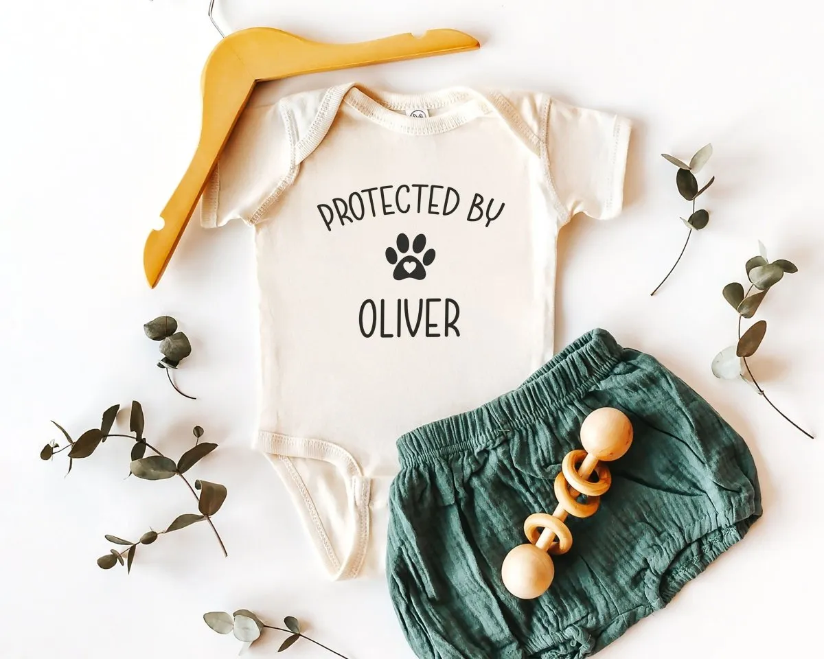 Protected By Dog Baby Onesie - Cute Personalized Bodysuit - Natural Custom Baby Onesie